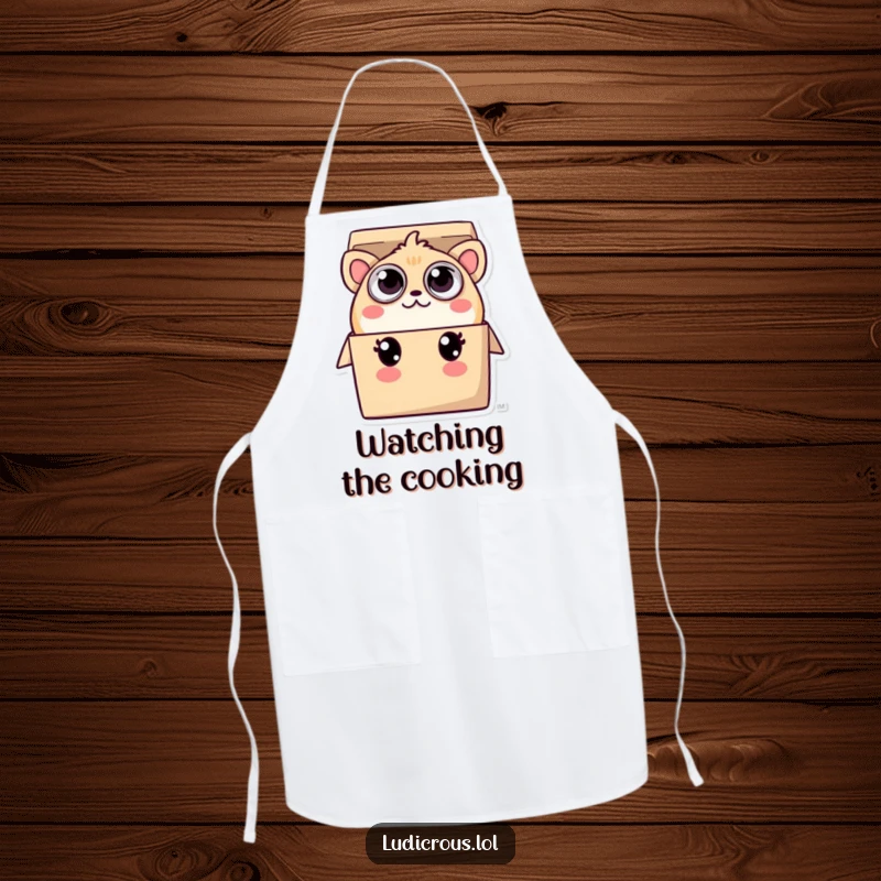 Funny apron illustration of a playful creature with many eyes, peeking out from a small box, ready for kitchen adventures.