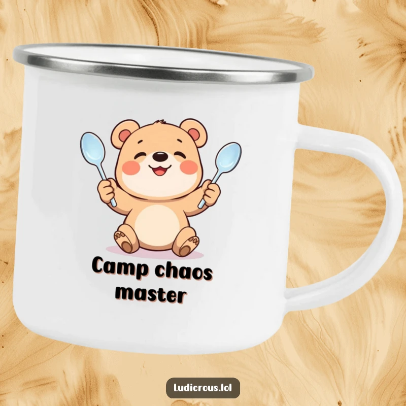 Funny camping mug featuring a smiling bear cub juggling bent spoons. Durable and humorous drinkware for outdoor enthusiasts.