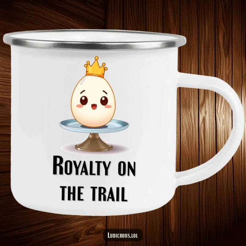 Funny camping mug featuring a surprised egg with a tiny crown wobbling precariously on a spinning plate, perfect for outdoor fun.