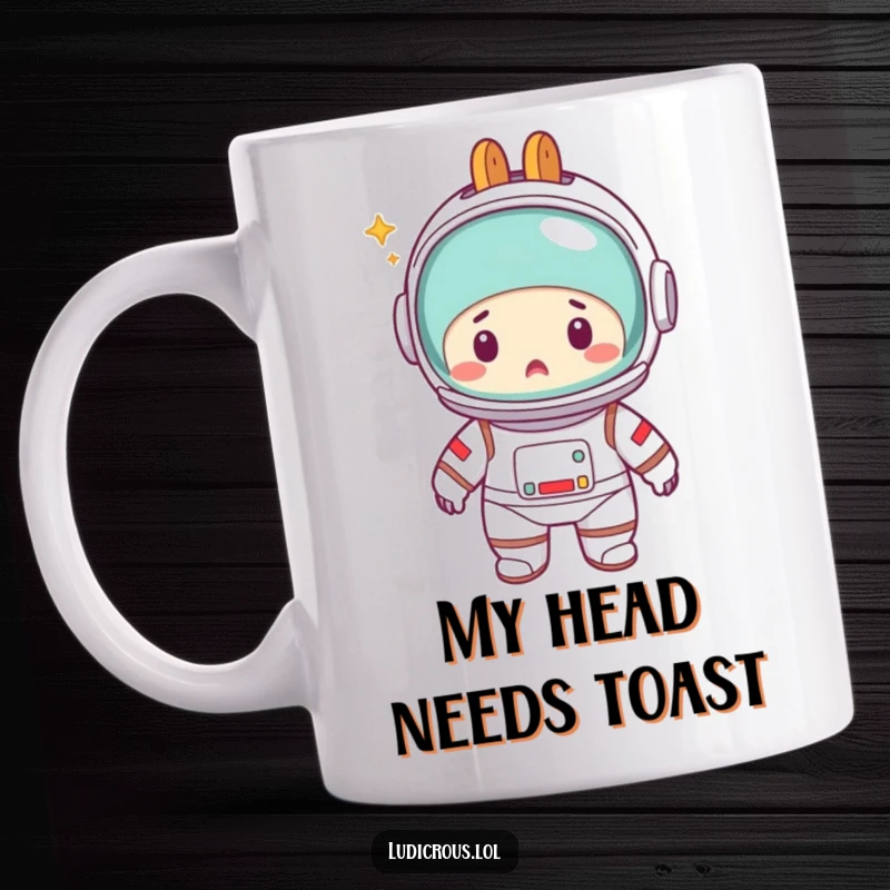 Funny mug showing a startled astronaut in a spacesuit, with a chrome toaster accidentally perched on its head instead of a helmet, eyes wide.