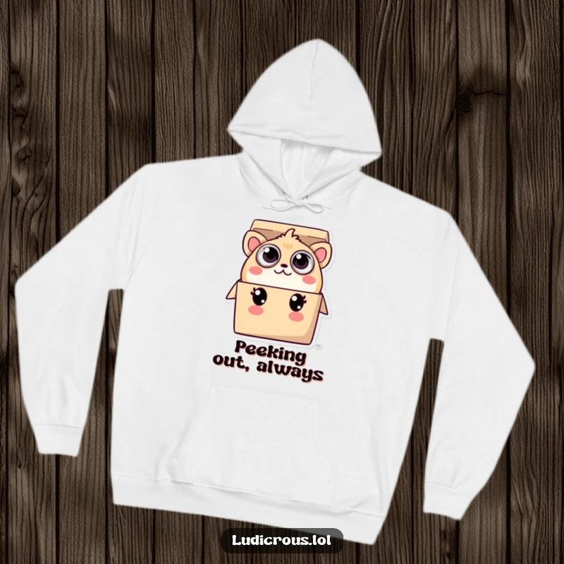 Funny hoodie design of a creature with many eyes, playfully peeking out from a small box, conveying a sense of playful curiosity.