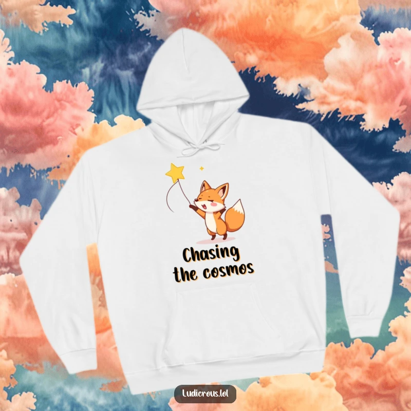 Cozy hoodie featuring a fox enthusiastically lassoing a shooting star, perfect for dreamers and night owls.