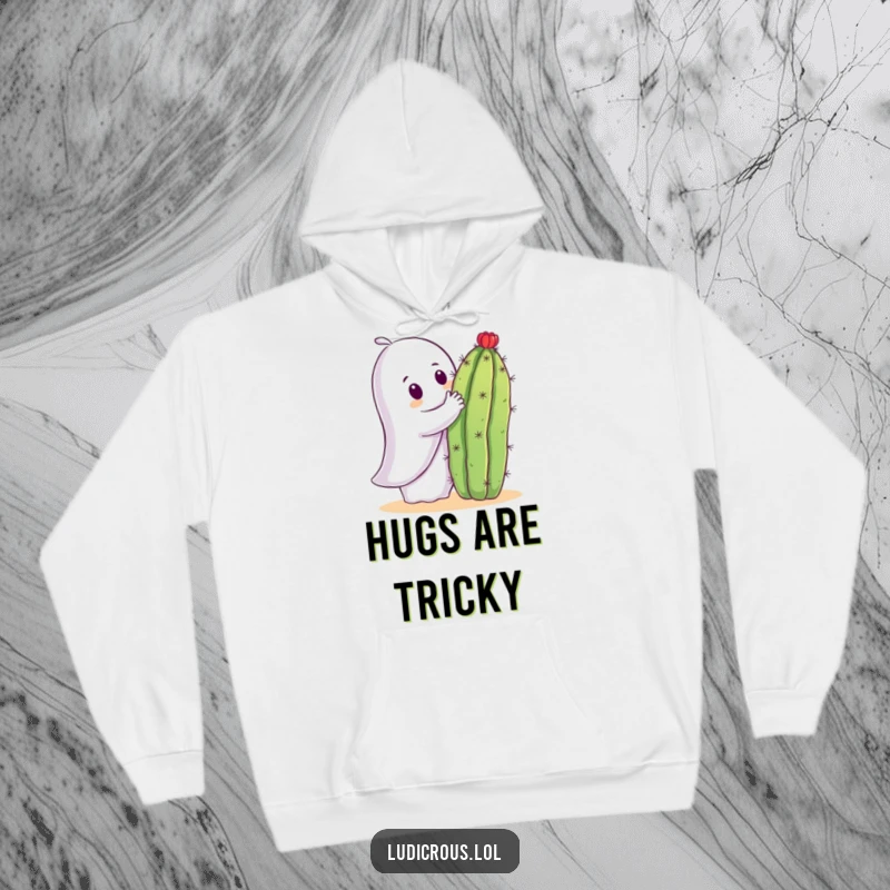 Funny hoodie featuring a friendly ghost trying to hug a very prickly cactus, illustrating a comical, painful situation.