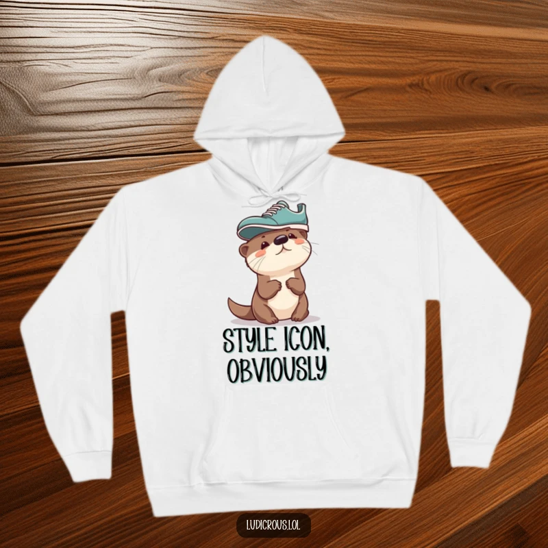 Funny Otter Hoodie, a curious otter with a shoe on its head, looking delightfully confused and happy, perfect for cozy laughs.