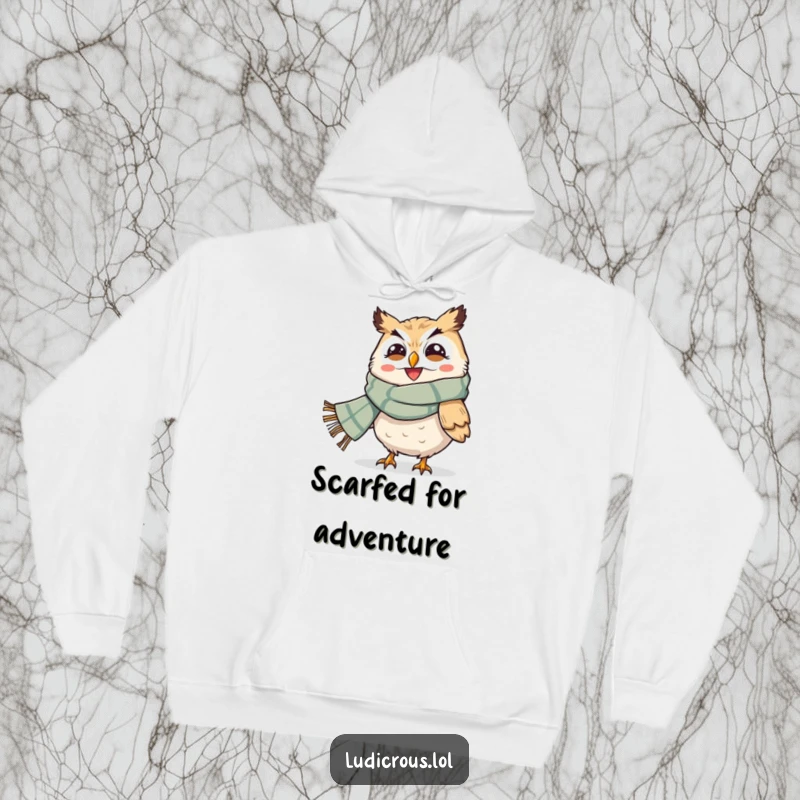 Funny hoodie showing a grinning owl with a giant scarf caught in strong winds, offering warm apparel with a humorous theme.