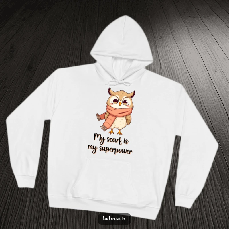 Funny hoodie with a grinning owl sporting a massive scarf, comically blown off its feet by fierce wind.