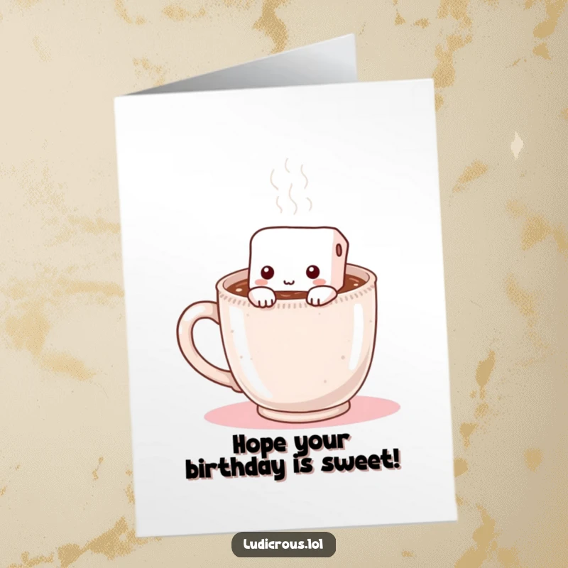 Funny Free Printable Birthday Card: A shy marshmallow attempts to hide inside a steaming mug of hot chocolate, offering warm wishes.