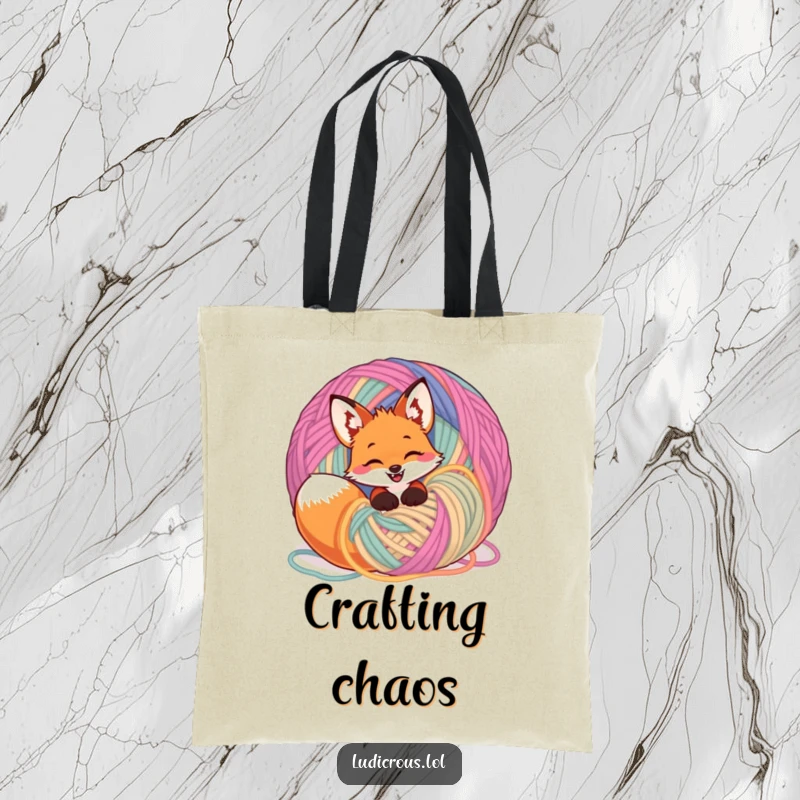 Funny giggling fox tangled in a giant ball of yarn on a tote bag, perfect for carrying supplies with playful charm.