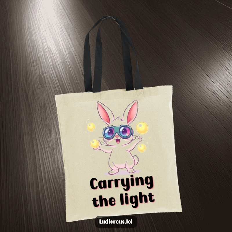 A rabbit with large goggles energetically juggles glowing orbs on a durable and funny tote bag.